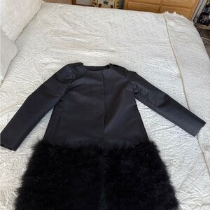 Elegant Black Dress with Faux Fur Hem